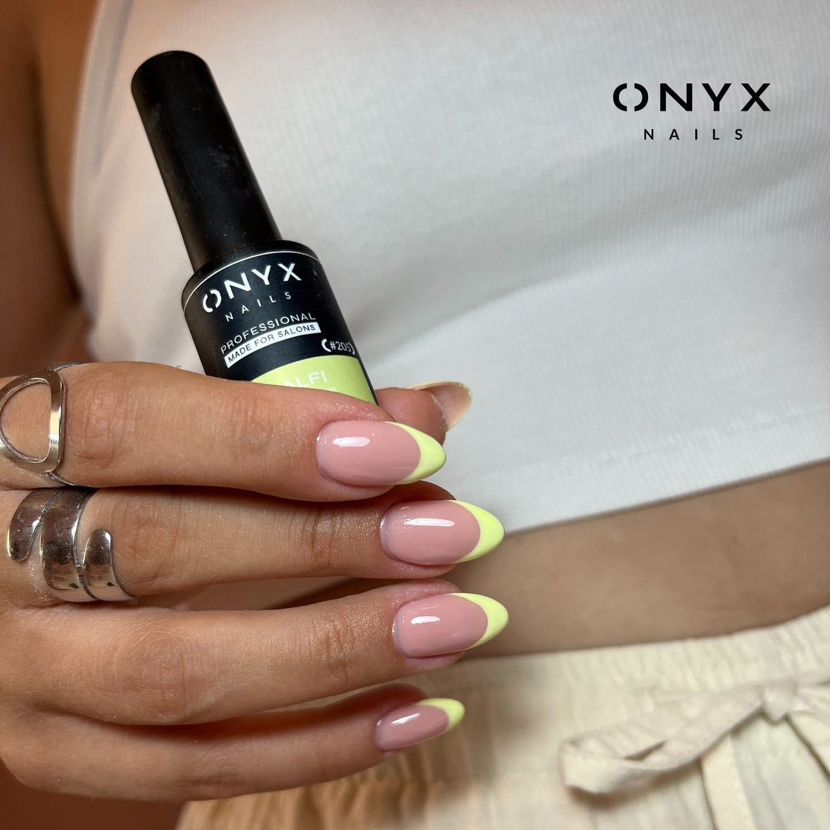 Nude nails with yellow French tips