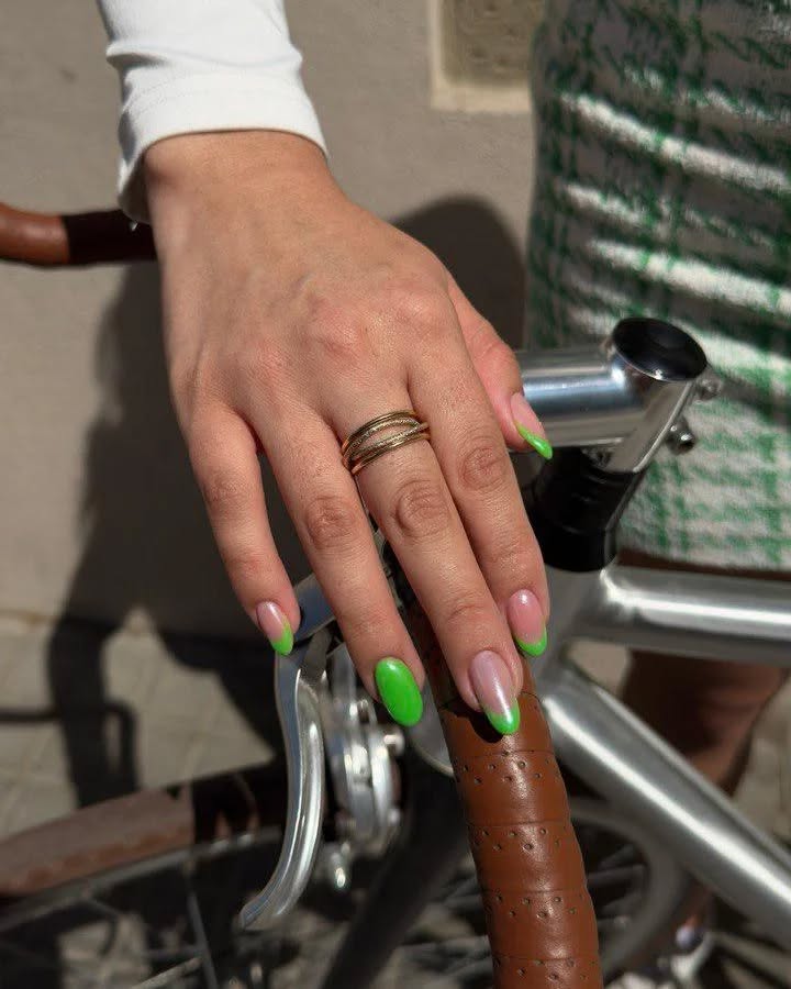 Nude nails with green French tips
