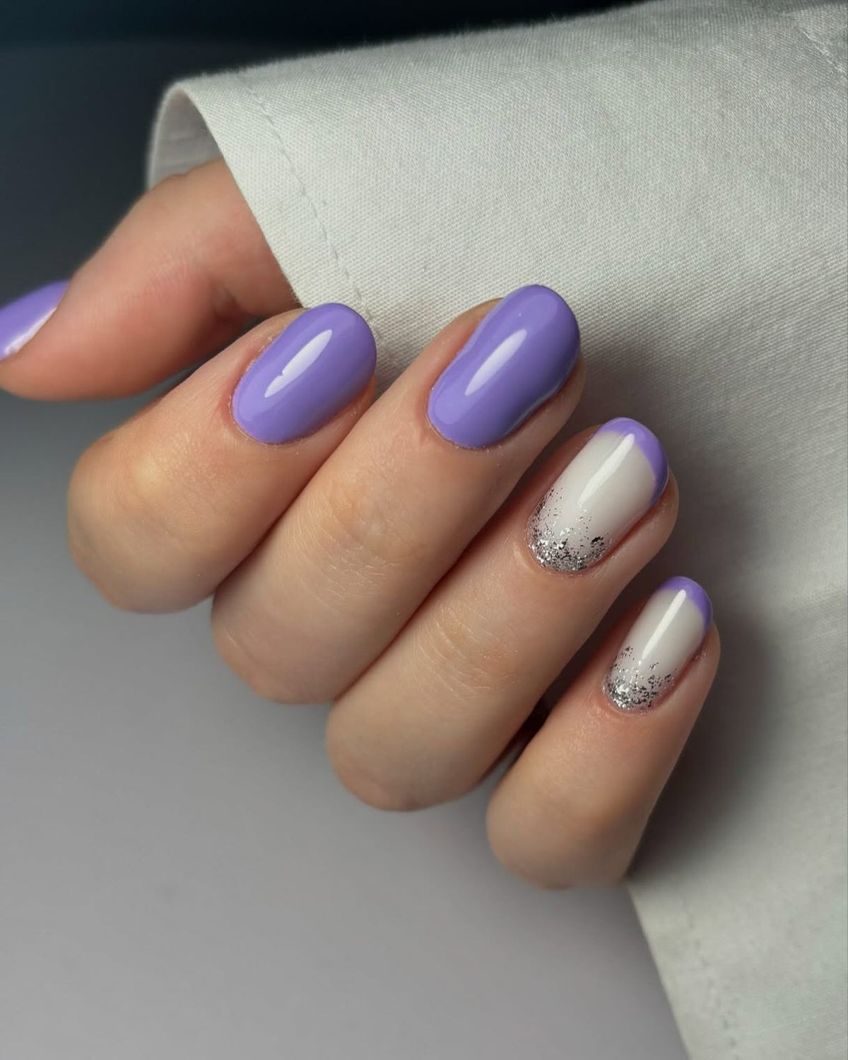 Lilac nails with silver glitter