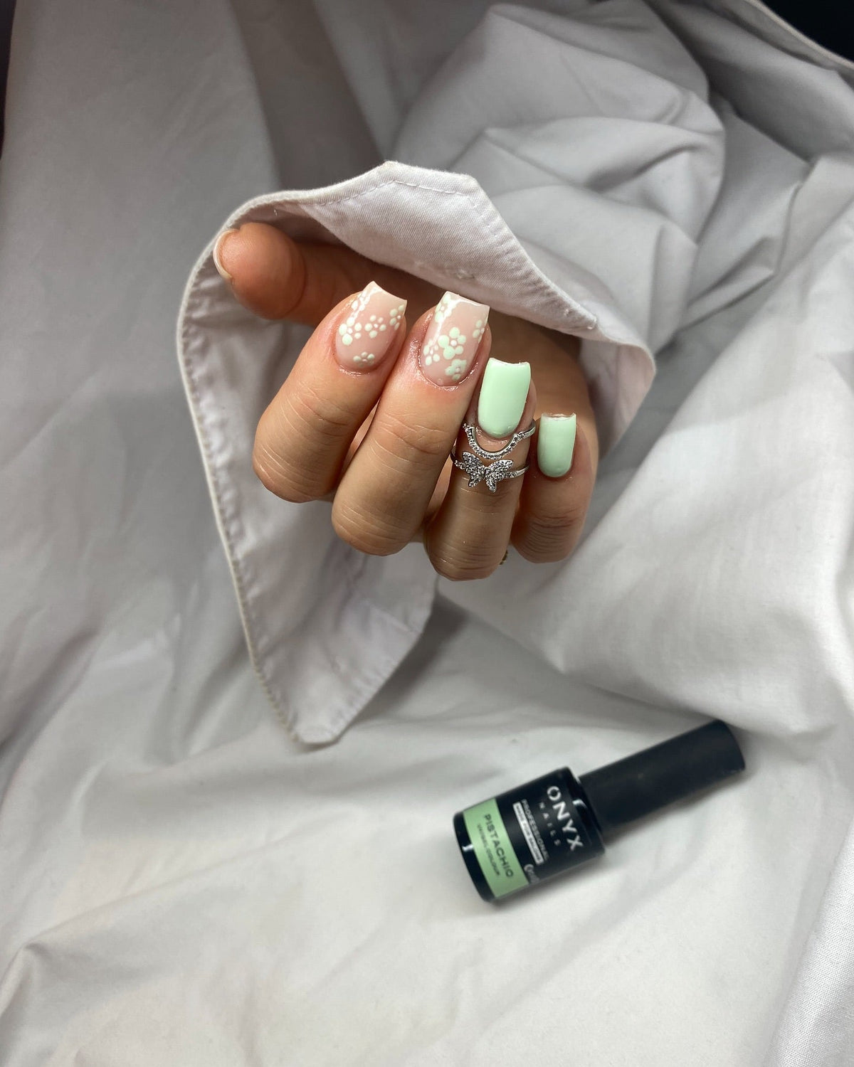 Mint and nude nails with designs
